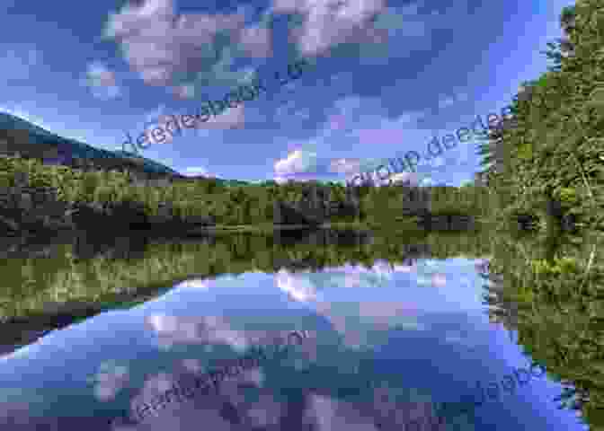 A Breathtaking View Of Equinox Pond Nestled Amidst The Green Mountains 10+ Great Day Hikes In Southern Vermont