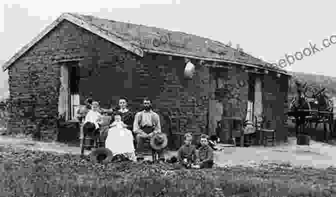 A Group Of Homesteaders Pose In Front Of Their Newly Built Cabin On The Great Plains. Bucking The Railroads On The Kansas Frontier: The Struggle Over Land Claims By Homesteading Civil War Veterans 1867 1876