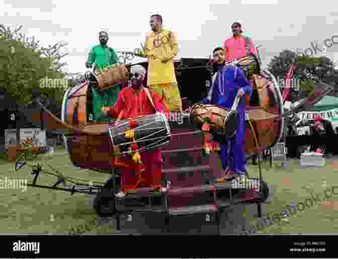 Dhol Drummers Performing At A Modern Concert, Incorporating Contemporary Beats And Electronic Elements Dhol: Drummers Identities And Modern Punjab