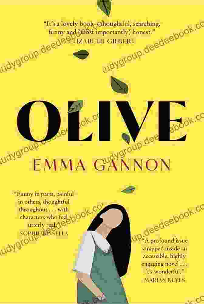 Olive Emma Gannon, A Young Woman With Long Brown Hair, Smiling And Looking At The Camera, Sitting In A Cafe With A Cup Of Coffee In Her Hand. Olive Emma Gannon